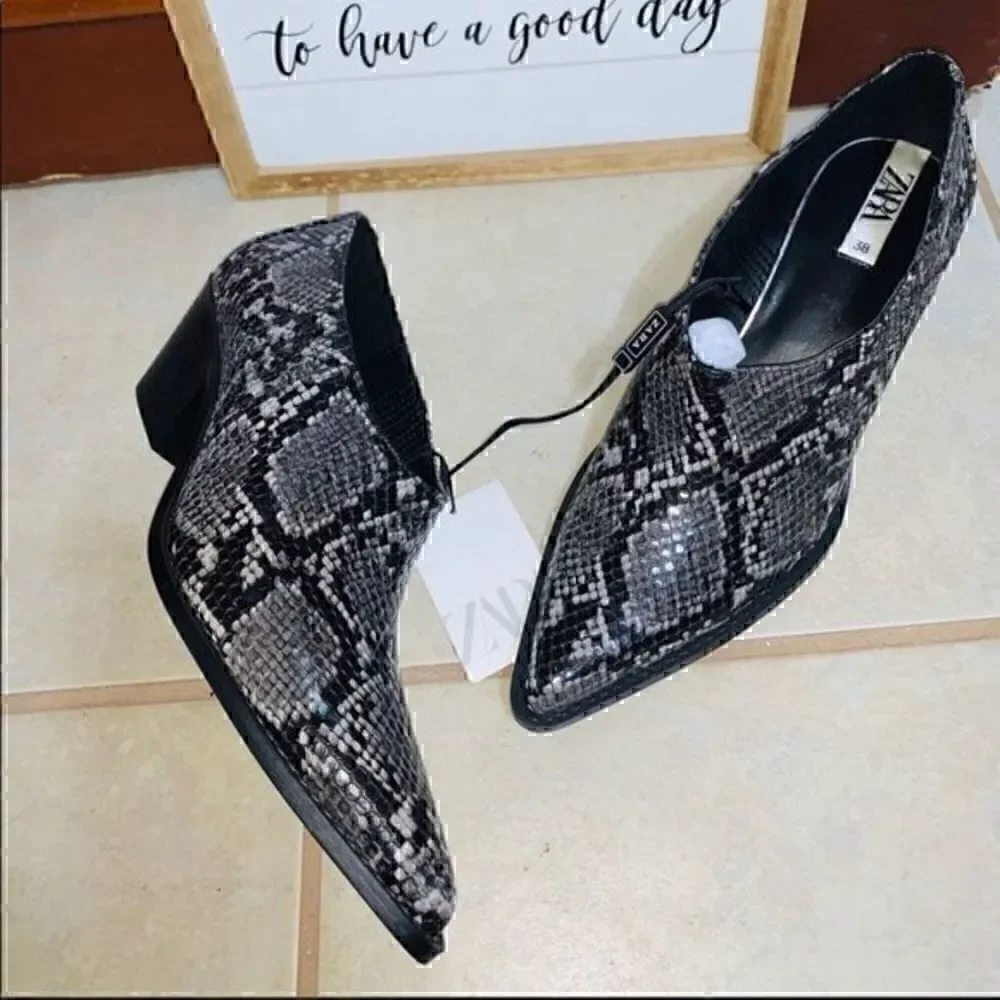 ZARA animal print cowboy heeled ankle boots